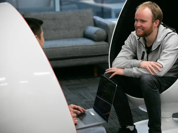 Rapid team members collaborating in a modern office