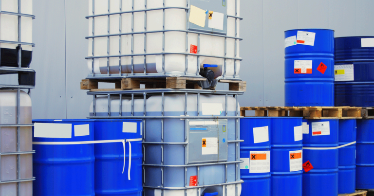 Blue drums for safely storing chemicals and hazardous goods onsite
