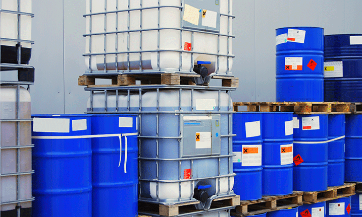 Blue drums for safely storing chemicals and hazardous goods onsite